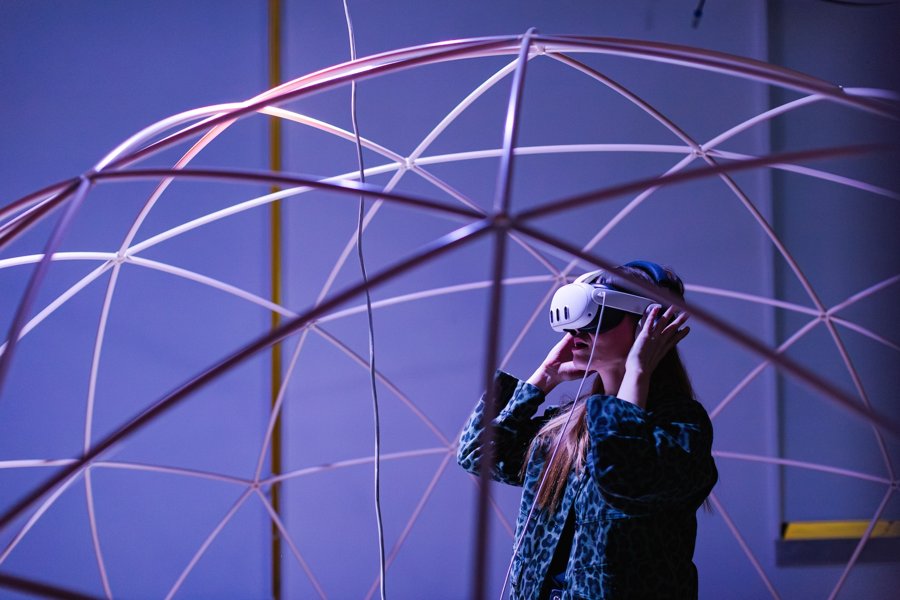 Visitor in a VR headset inside a geodesic dome installation at Athens Digital Arts Festival