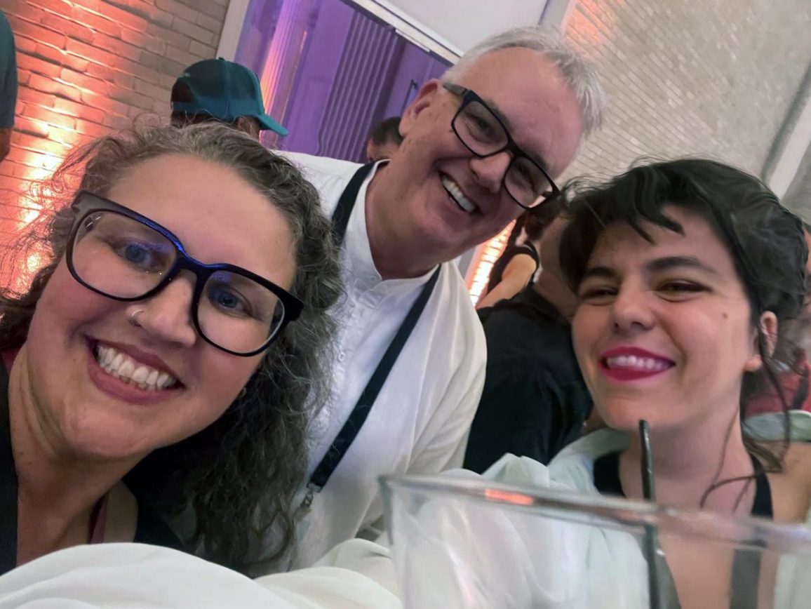 Elena Dimopoulou (right) smiling in a selfie with two attendees at the Cesium Developer Conference, Philadelphia, 2025